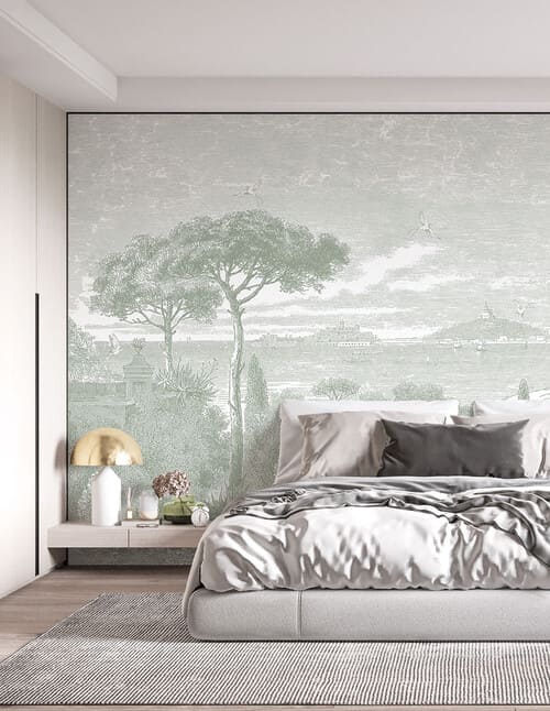 Photo d'une chambre avec un Papier peint panoramique vert dans un style gravure, qui représente un paysage de bord de mer