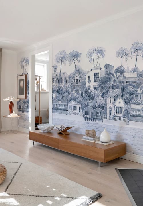 Salon avec un Papier peint panoramique bleu représentant une vue réaliste d'un bord de mer de la ville d'Arcachon dans un style de peinture à l'aquarelle