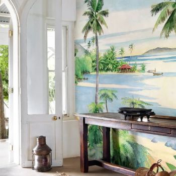 Entrée avec un Papier peint panoramique coloré représentant un paysage des Caraïbes