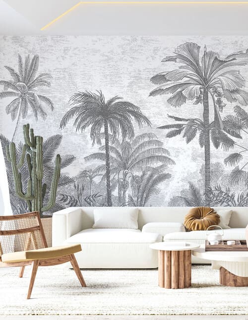 Papier peint panoramique dans les tons gris représentant des palmiers.